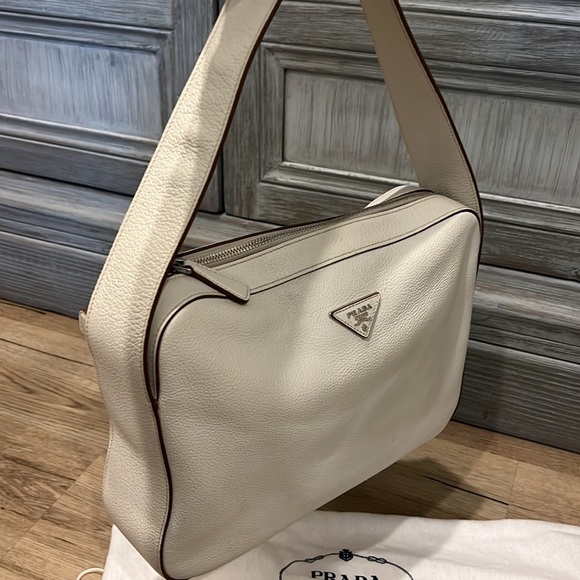 Authentic off-white leather Prada bag. Gently loved! Comes with dust bag. - Picture 2 of 10